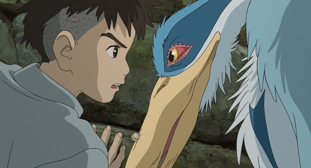 Mahito looking at the grey heron close up in The Boy and the Heron, Studio Ghibli 2023