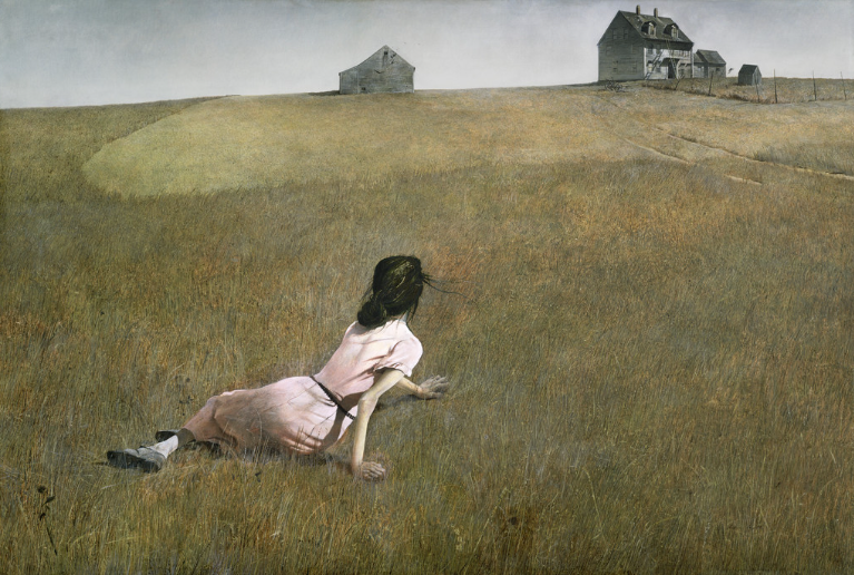 A woman in a pink dress lies in a dry, golden field, reaching towards a grey farmhouse on the hill above her.